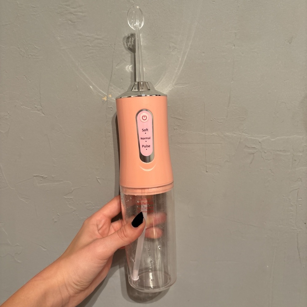 Pink Portable Water Flosser